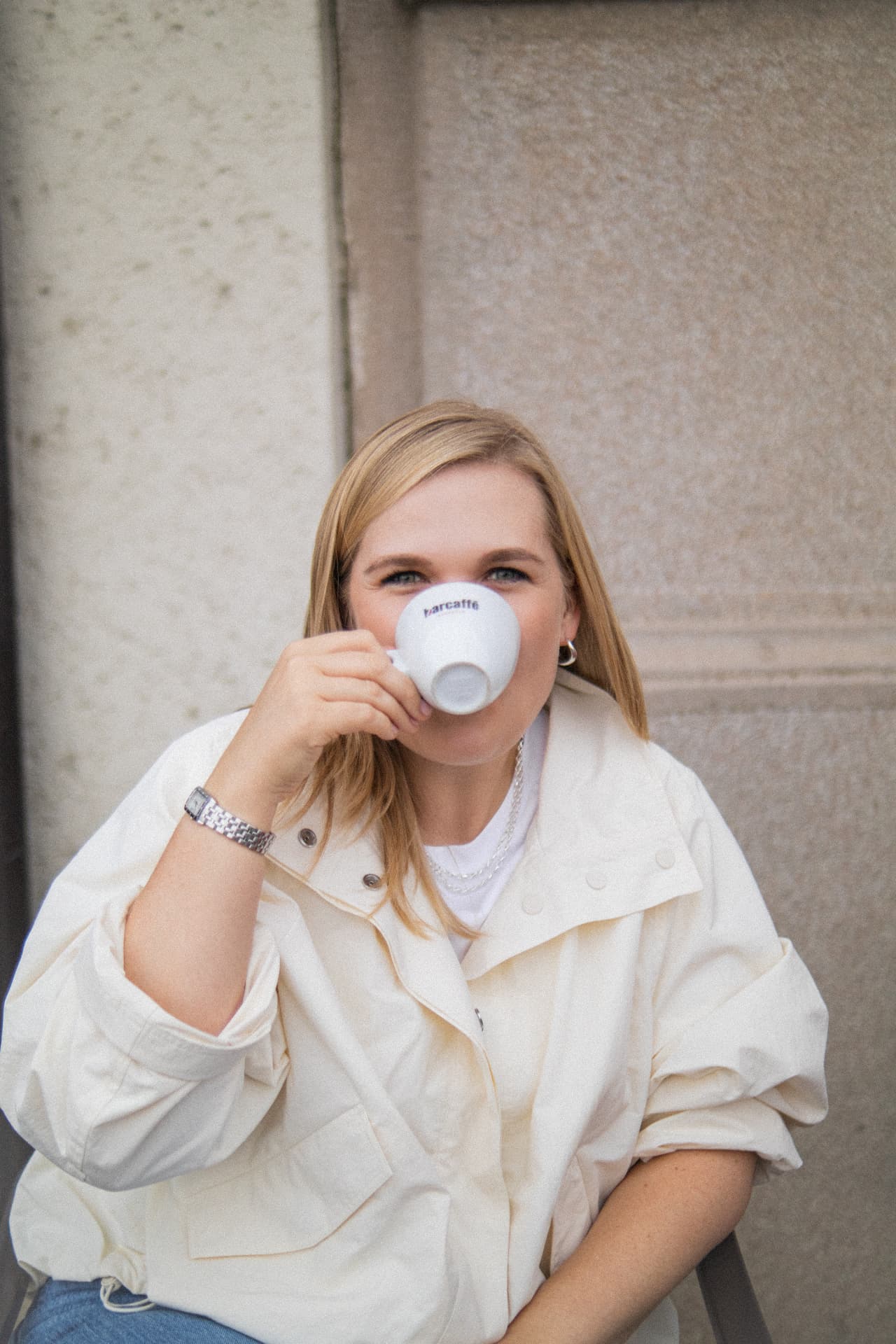 Olga Skipper smiling over an espresso cup
